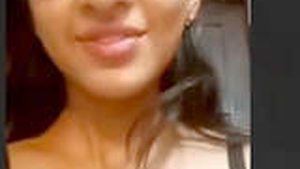 A gorgeous girl flaunts her body in a video call