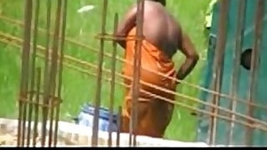 Desi woman caught bathing outdoors