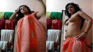 A pretty girl from India gets naked for cash and flaunts her breasts and pussy