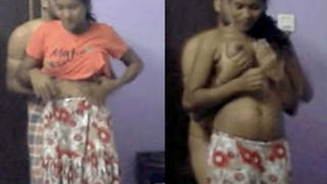 Arousing video of a South Asian woman performing oral sex and flaunting her breasts for financial gain