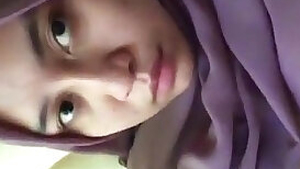 Hijab wearing brunette is about to get freaky
