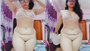 Busty Indian babe flaunts her big butt and vagina