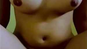 Watch a stunning Indian Desi girl with big breasts ride her lover with sensuality