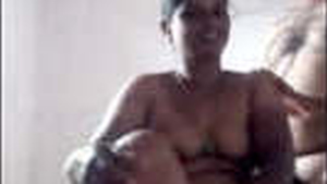 Mature Indian aunt gets intimate with her partner from behind