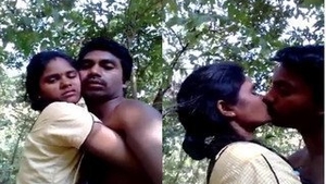 Passionate Indian couple kissing in the great outdoors