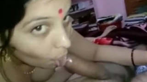 A married woman giving oral sex and having intercourse with a penis