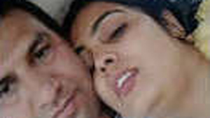 A Pakistani couple gets frisky in the backseat of a car