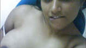 Indian wife Parvati displays her pregnant belly and milk-filled breasts in a video