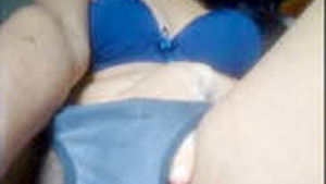 Young college girl pleasures herself on camera