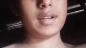 A charming and attractive Bangladeshi woman pleasures herself in a rural setting