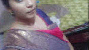 Desi girl flaunts her large breasts in a video