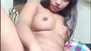 Naughty Indian babe pleasures herself with a banana in this steamy video