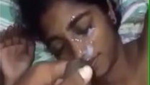 Watch as a beautiful stepsister gives her brother a facial cumshot