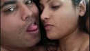 A lovely pair engages in passionate lovemaking