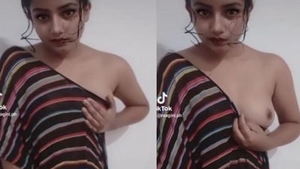 TikTok video of curvy Indian girl flaunting her large breasts