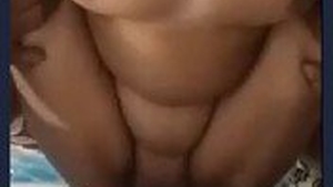 A young servant servs an Indian mature aunty
