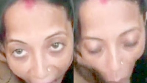 Watch a stunning Indian bhabhi give a blowjob to a well-endowed black man