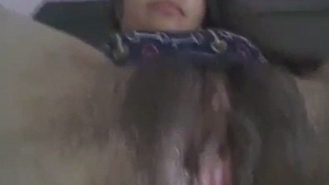 Bhabi's hairy pussy on display in a steamy video