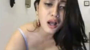 Watch a sexy aunty show off her body and have a fun chat in this video