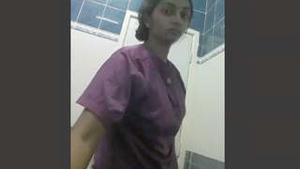 Steamy bathroom encounter with attractive woman captured on camera