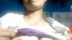 A young woman from India unveils her exciting breasts