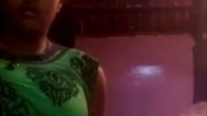 A charming Tamil student displays her generous curves