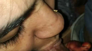 Bhabhi's hand provides a sensual blowjob