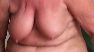 British and full figured grandma Sandie gives old pussy a workout