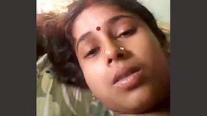 Busty bhabhi reveals her assets and fingers herself in erotic video