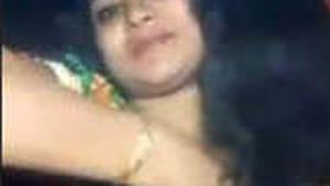A charming girl flaunts her body in a video call