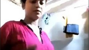Beautiful girl in the bathroom getting naked