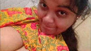 Watch a Busty Girl Get Naked in This Hot Video