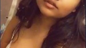 Cute Indian girl flaunts her big breasts and private parts in a video