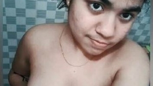 A cute desi girl gets naked in the bathtub