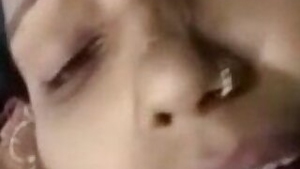 Married Indian lady busy with piercing teases lover in XXX video