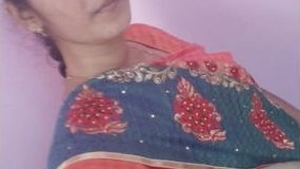 An Indian college girl proudly displays her large breasts in an adorable video