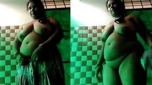 Aunty's big belly and ample curves on display in this video
