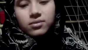 Desi wife in hijab pleases lover with solo masturbation