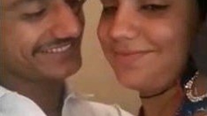 Outdoor couple shares intimate moments with passionate kissing