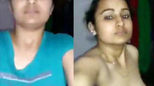 Sexy indian girl showing her boobs and fingering pussy