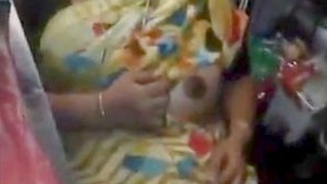 Aunt flaunts her large breasts in front of the shop owner