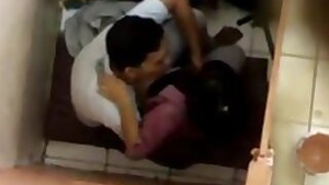 Brave Desi teens sneak in toilet cabin to have there quick XXX chudai