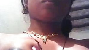 Indian colleen puts her XXX dark nipples in camera performing sex show