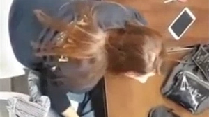 A sensual handjob performed by a college girl on camera