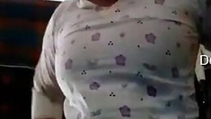 Tempting Desi mom flashes tits gets dressed in the barn