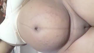 Indian big beautiful woman aunt displays her attractive genitals and buttocks