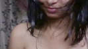 Young and attractive Indian girlfriend strips down in a sensual recording