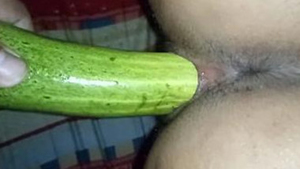 Indian girl uses cucumber to satisfy sexual desires instead of sex toys