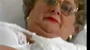 Chubby Granny With Glasses Masturbates