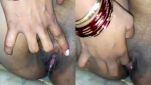 Aroused Indian wife urinating and stimulating herself